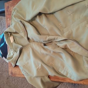 Size S green windbreaker